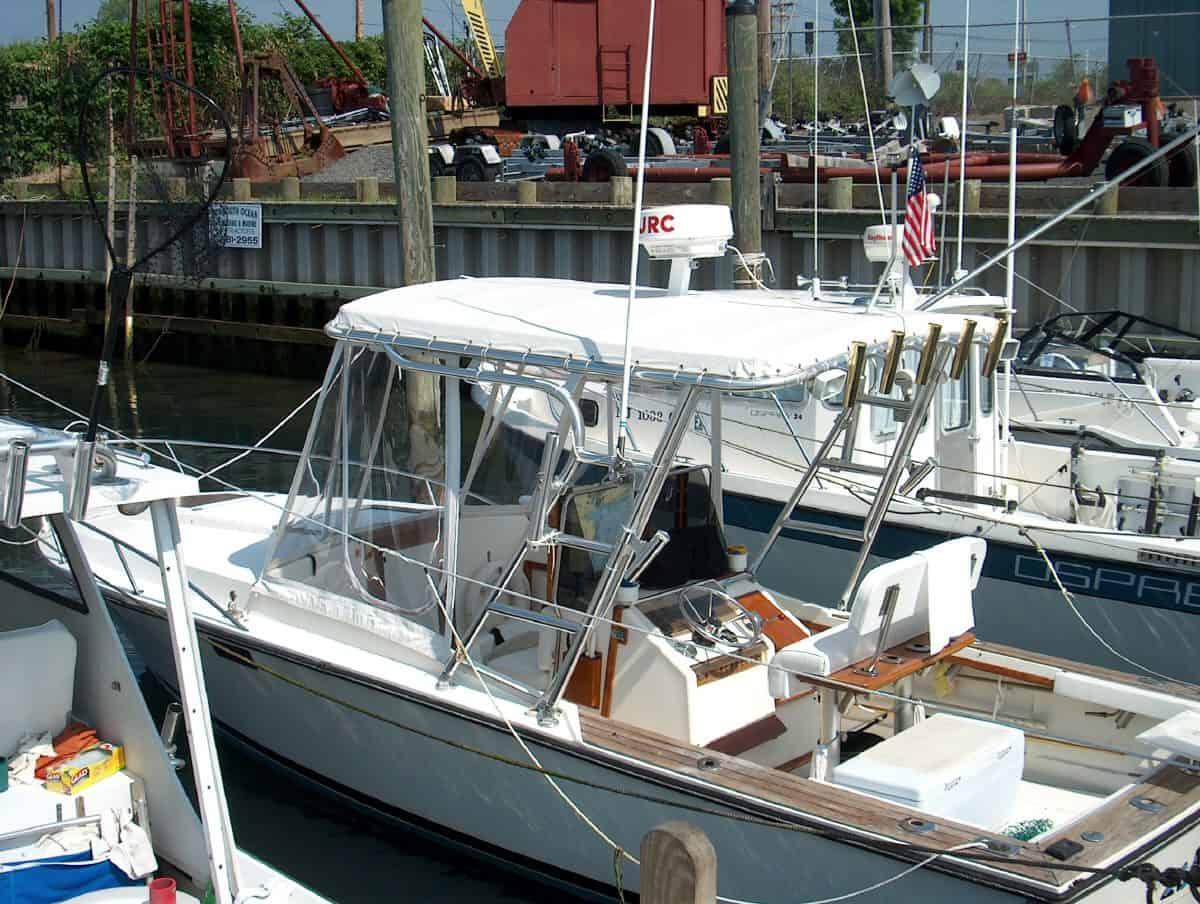 Atlantic Towers Top installed on a Blackfin boat docked at a marina, showcasing its structure and design.