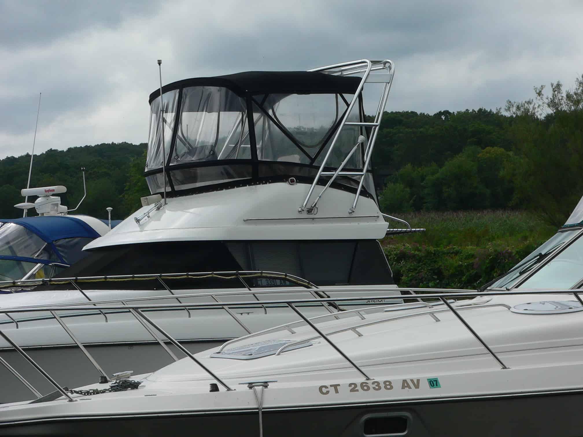 Atlantic Towers Arch installed on a Silverton 34 Convertible boat, featuring a protective canvas enclosure.