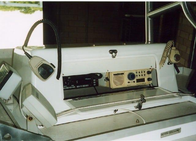 Atlantic Towers T-Top installed on a Boston Whaler 22 Outrage center console boat shown from the side.