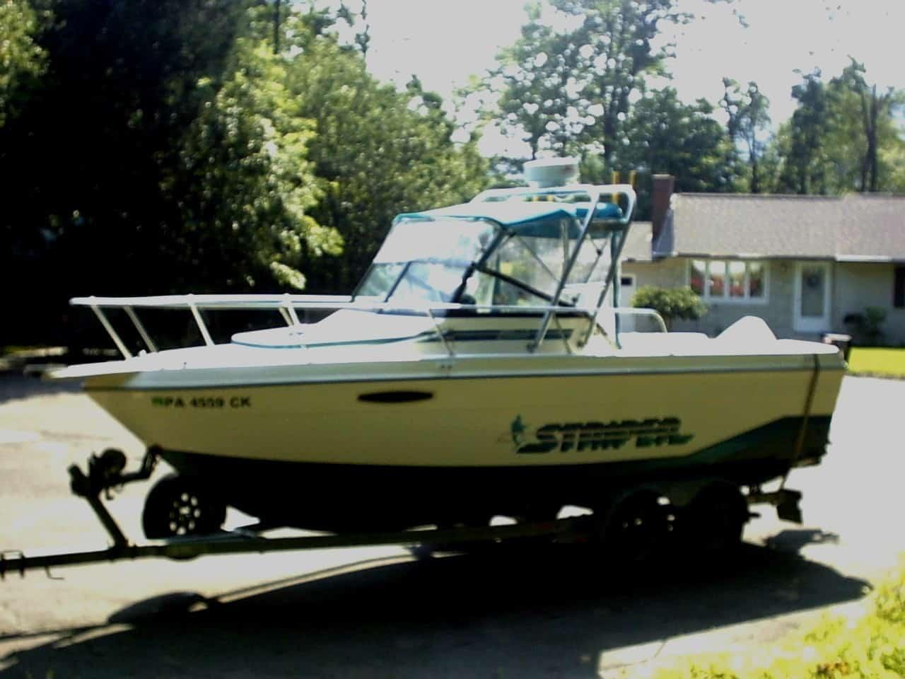 Atlantic Towers arch on a Seaswirl 210 Striper walkaround boat, showcasing its sleek design and functionality.