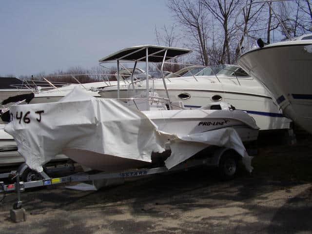 Atlantic Towers T-Top installed on a Pro Line 190 Sport center console boat viewed from the side on water