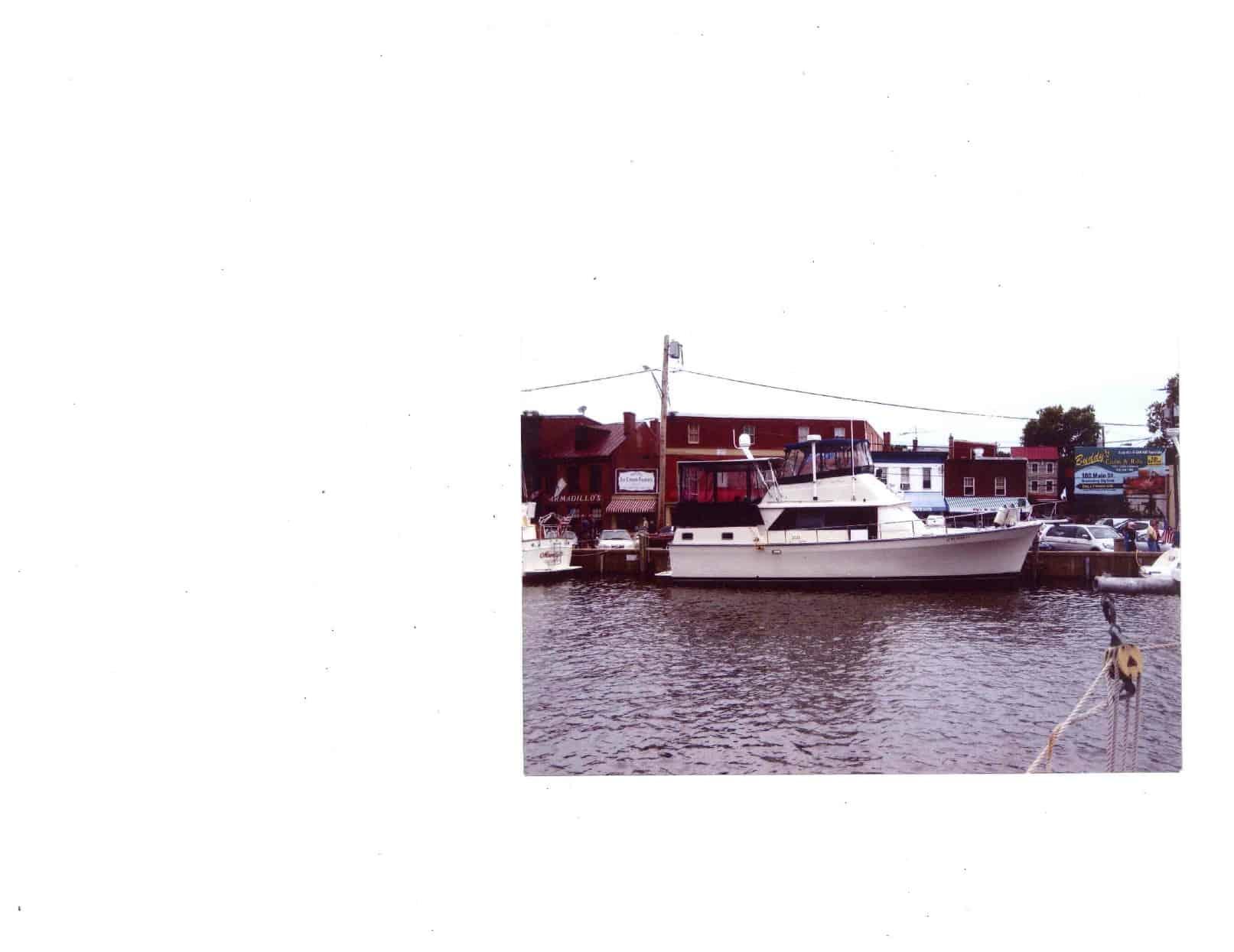 Atlantic Towers Aft Deck Top installed on a Mainship 40 Double Cabin boat, docked in a marina setting.