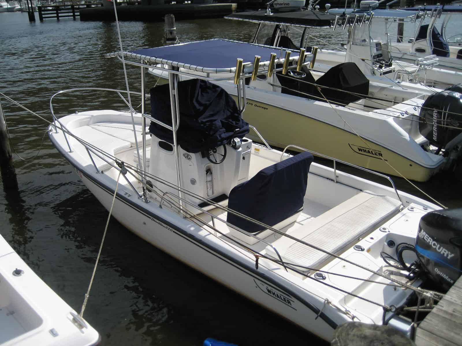Atlantic Towers T-Top on a Boston Whaler 220 Dauntless center console boat, providing shade and support.