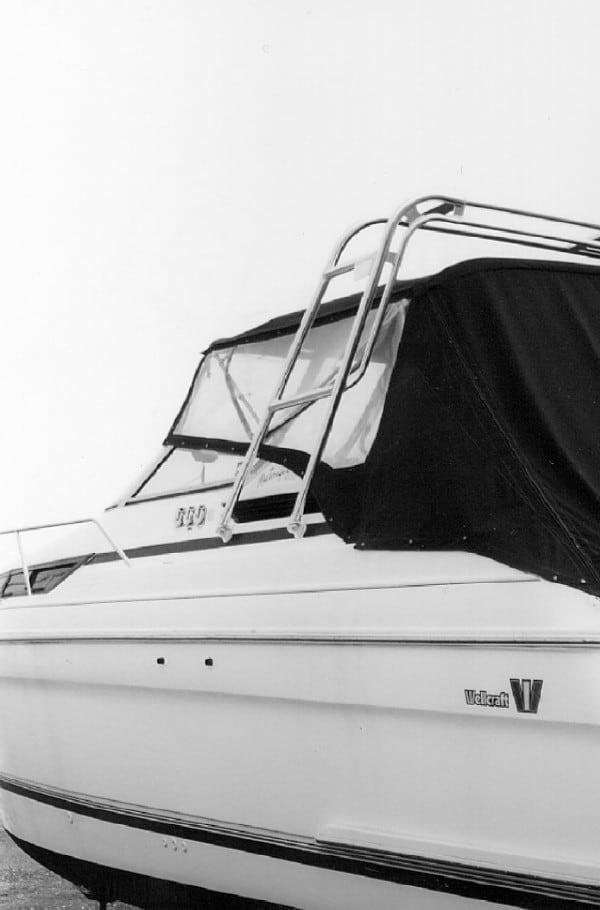 Atlantic Towers arch installed on the cabin of a Wellcraft 3600 Martinique boat with black canvas cover.