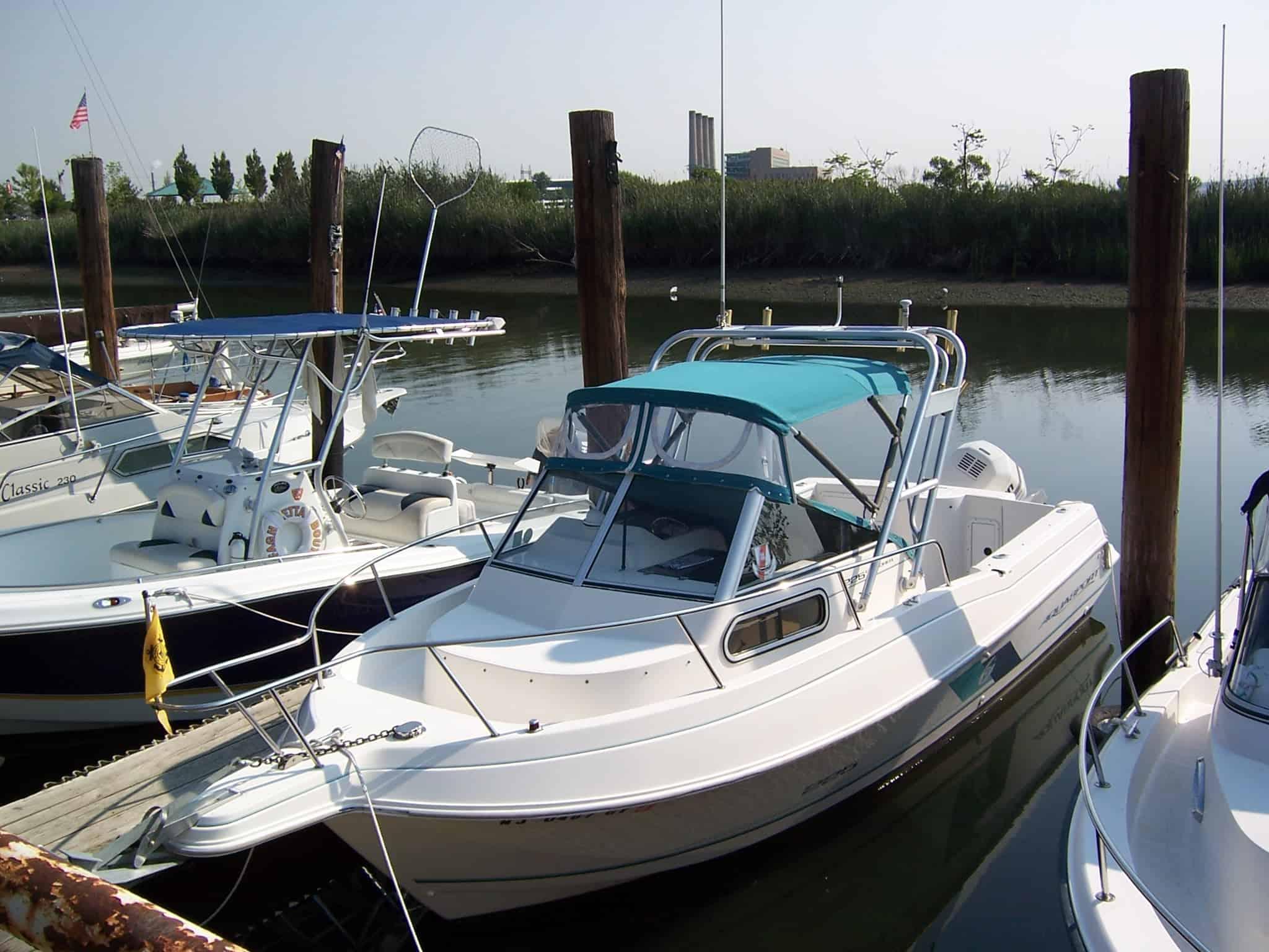 Atlantic Towers arch installed on an Aquasport 225 Explorer walkaround boat.