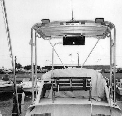 Atlantic Towers Top installed on a Bertram 26 Sport Convertible, showing the aft view with seating covered.