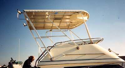 Atlantic Towers Top installed on a Tiara 3300 Flybridge boat, showing the tower structure and sunshade.
