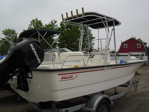 Atlantic Towers T-Top installed on a Boston Whaler 18 Outrage center console boat, showing roof frame and supports