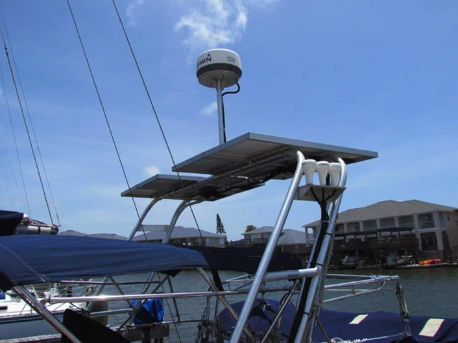 Atlantic Towers Arch mounted on a boat, featuring a radar unit and solar panels against a blue sky.