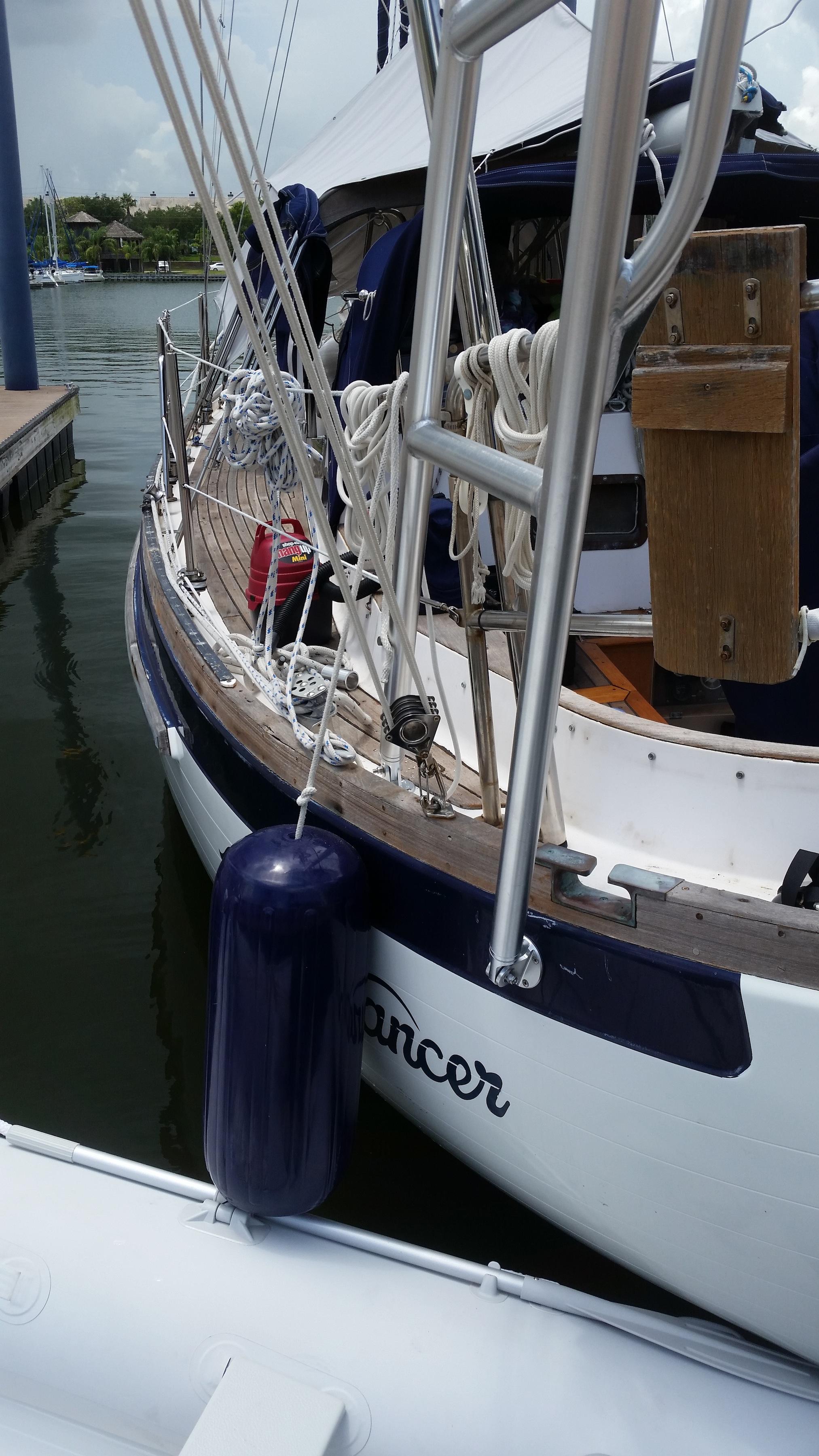 Atlantic Towers Arch installed on a Passport Yachts 42 Canoe Stern sailboat, shown from the stern on water.