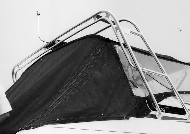 Atlantic Towers arch installed on the black canvas canopy of a Wellcraft 3600 Martiniqe boat.