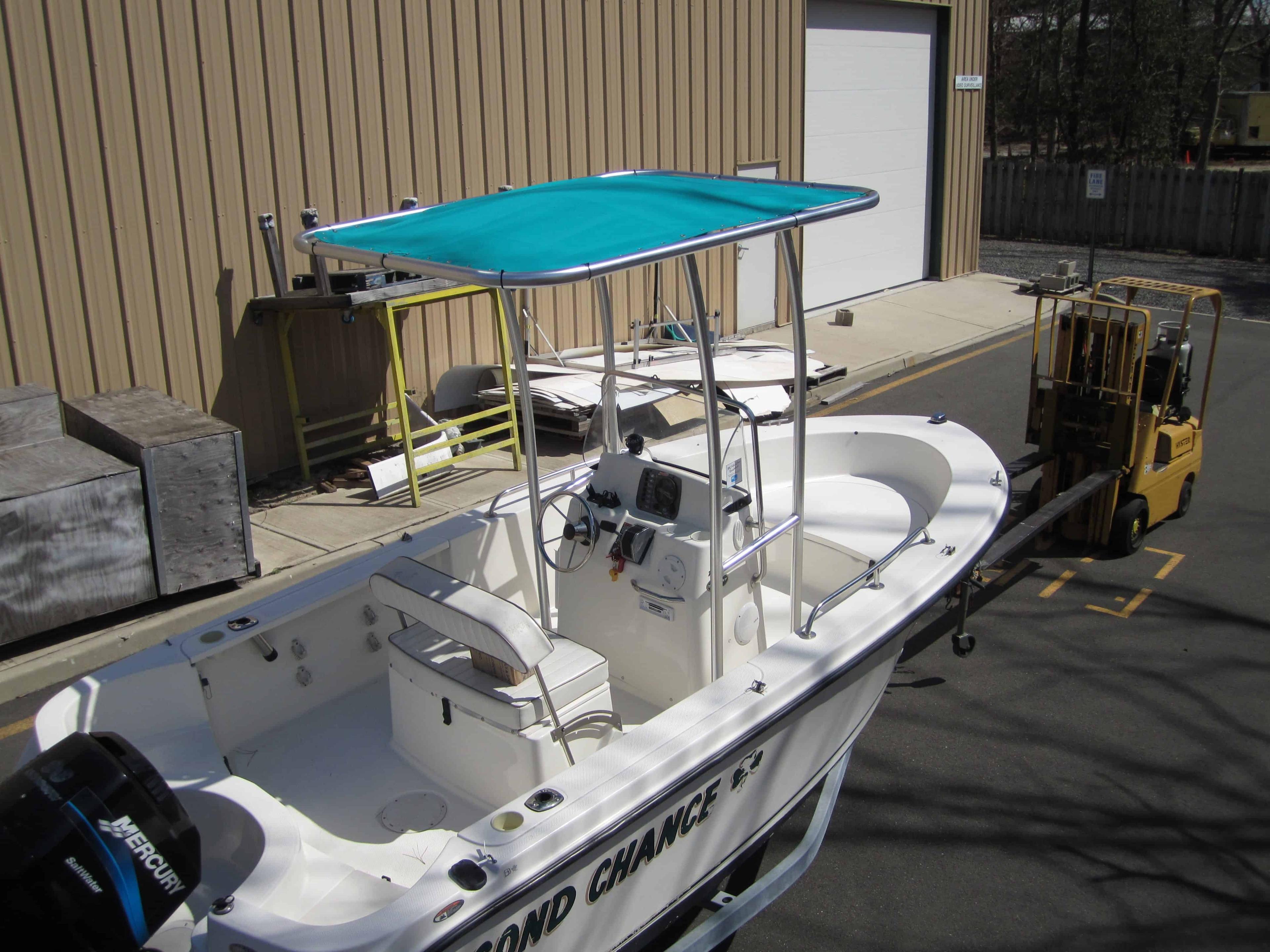 Atlantic Towers T-Top on a Trophy 17 center console boat, showcasing a sleek design for sun protection.