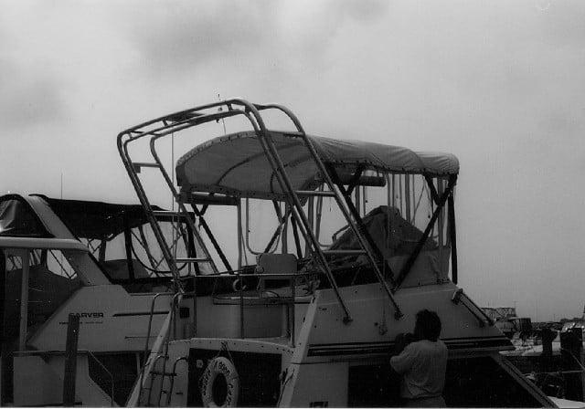 Atlantic Towers Arch installed on a Trojan 30 Flybridge Sedan boat, showing its structure and design.