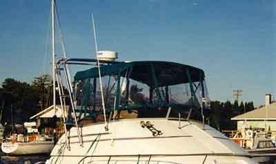 Atlantic Towers Arch installed on a Carver 310 Santego, showcasing the boat's upper structure and canopy.