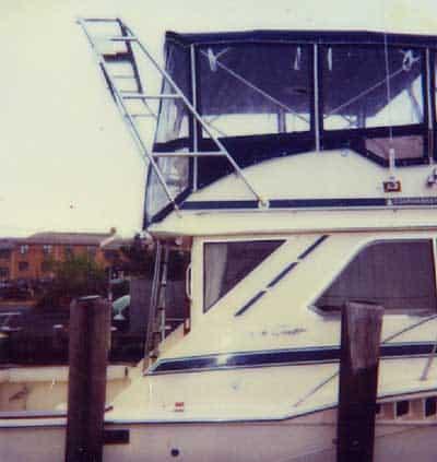 Atlantic Towers Arch installed on a Chris Craft 360 Sport Sedan boat, showing the side view and enclosure.