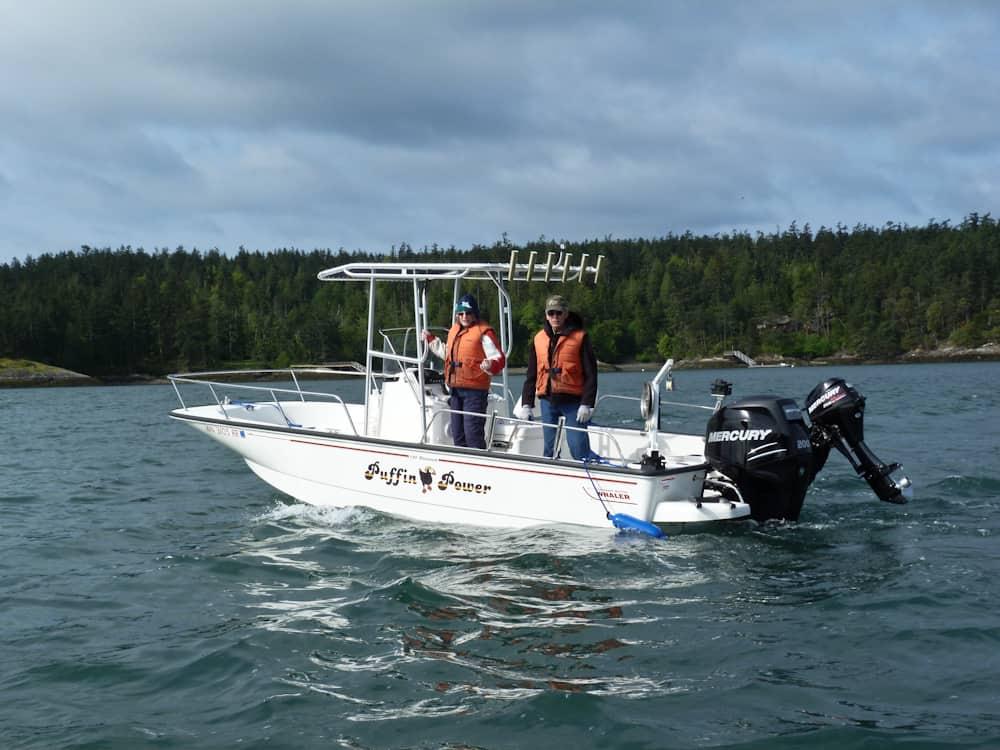 Atlantic Towers T-Top on a Boston Whaler 210 Montauk center console boat, providing shade and support.