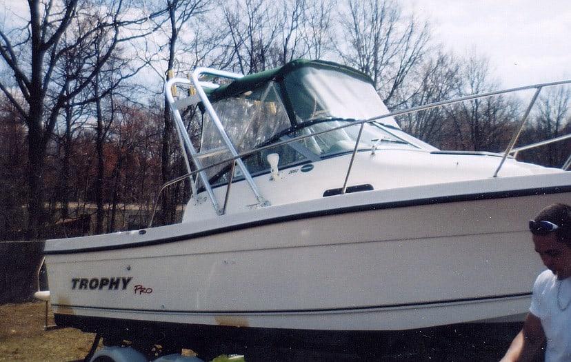 Atlantic Towers Arch on a Trophy 2052 Trophy Pro boat, parked in a wooded area.