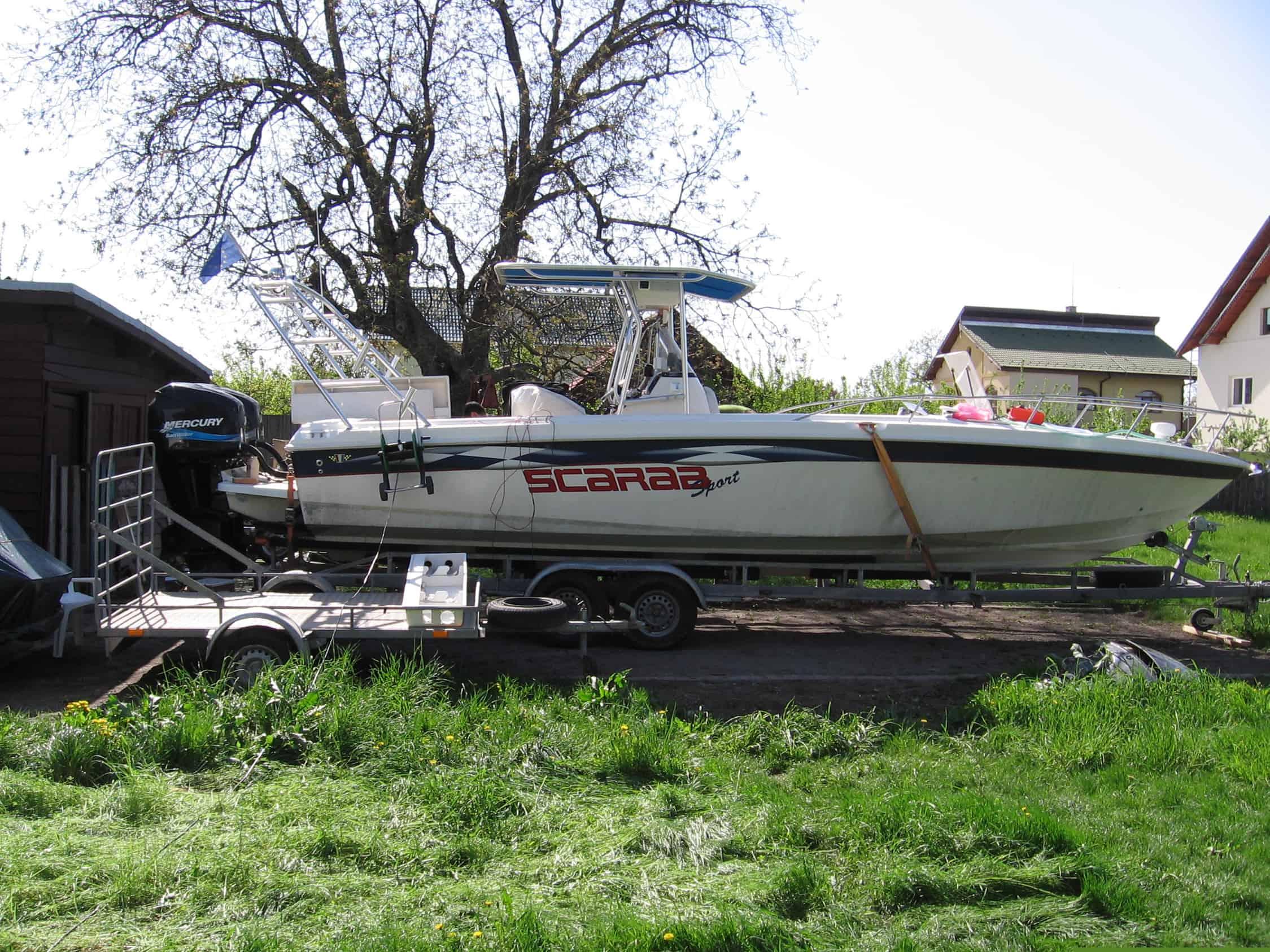 Atlantic Towers T-Top installed on a Wellcraft Scarab 30 boat, designed for enhanced shade and support.
