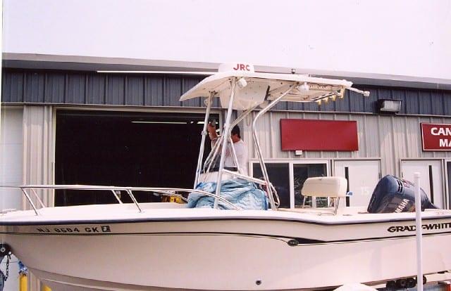 Atlantic Towers T-Top installed on a Grady White center console boat, shown at a marina or boat shop.