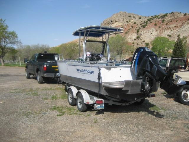 Atlantic Towers T-Top installed on Wooldridge 20 center console boat with white hull and stainless steel frame