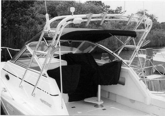 Atlantic Towers Arch installed on a Phoenix 27 Tournament II boat, featuring a black canopy and seating area.