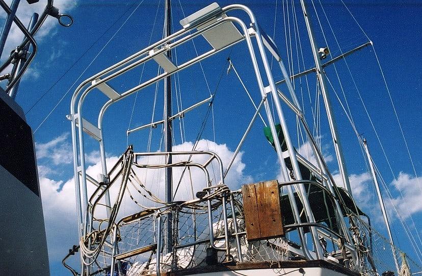 Atlantic Towers Arch mounted on a Pearson 385 boat, with rigging and a blue sky in the background.