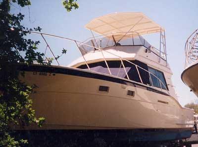Atlantic Towers Top installed on a Hatteras 37 Convertible boat, showcasing the boat's sleek, classic design.