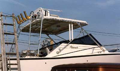 Atlantic Towers Tuna Tower installed on Albemarle 275/280 Express boat with fishing rod holders and ladder nearby