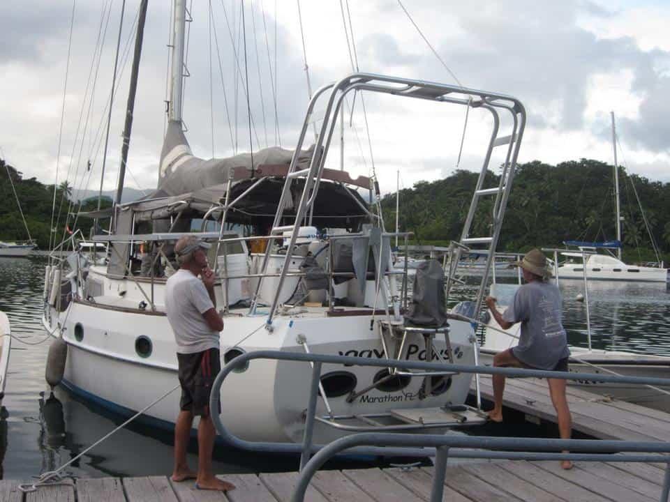 Atlantic Towers Arch installed on a CSY 44 Mid Cockpit cutter sailboat shown from the side on water.