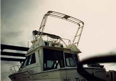 Atlantic Towers arch mounted on a Tiara 3600 Convertible flybridge boat, designed for enhanced performance and aesthetics.