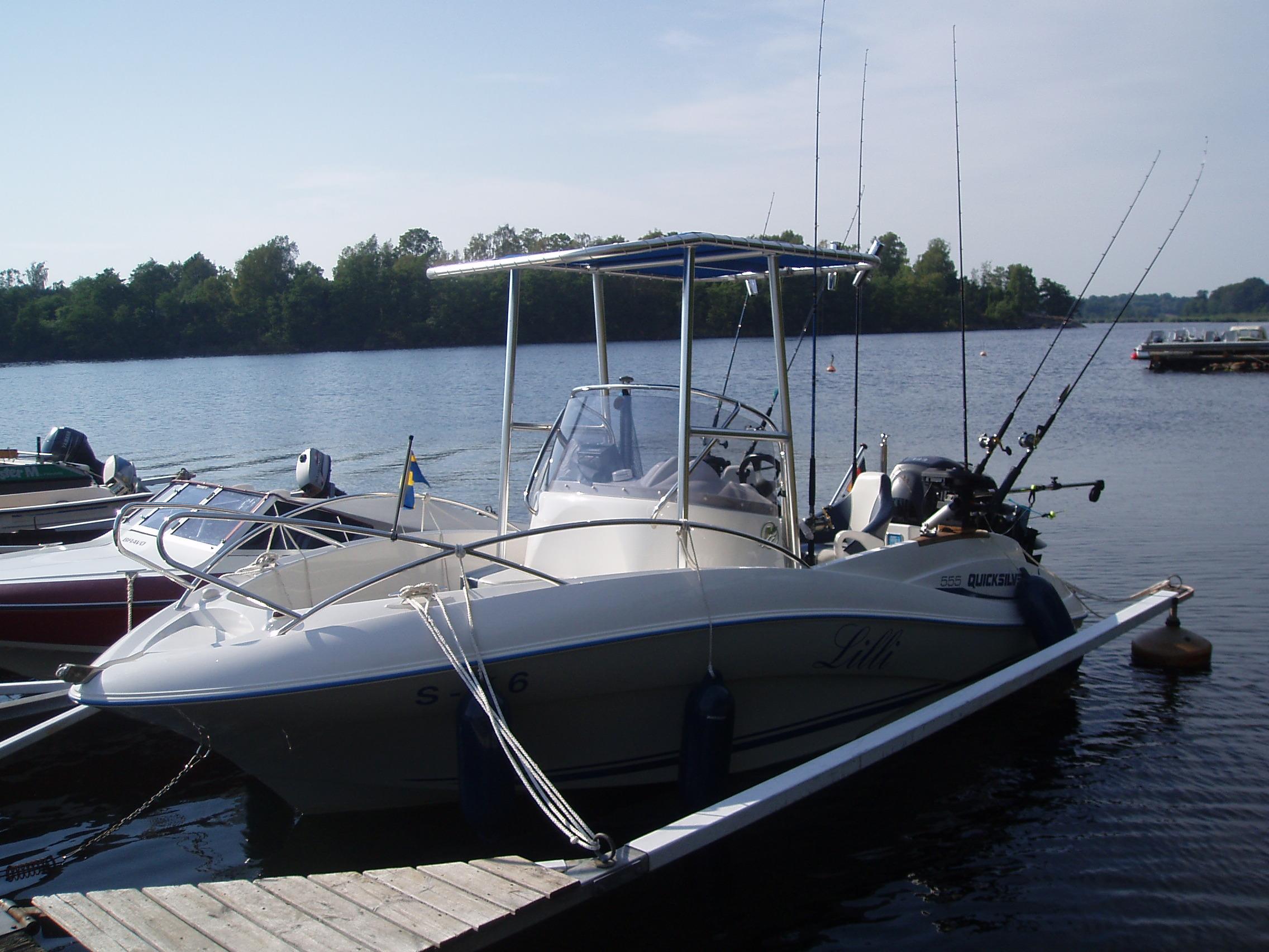 Atlantic Towers T-Top on a Quicksilver Commander center console boat, showcasing its sleek design and functionality.