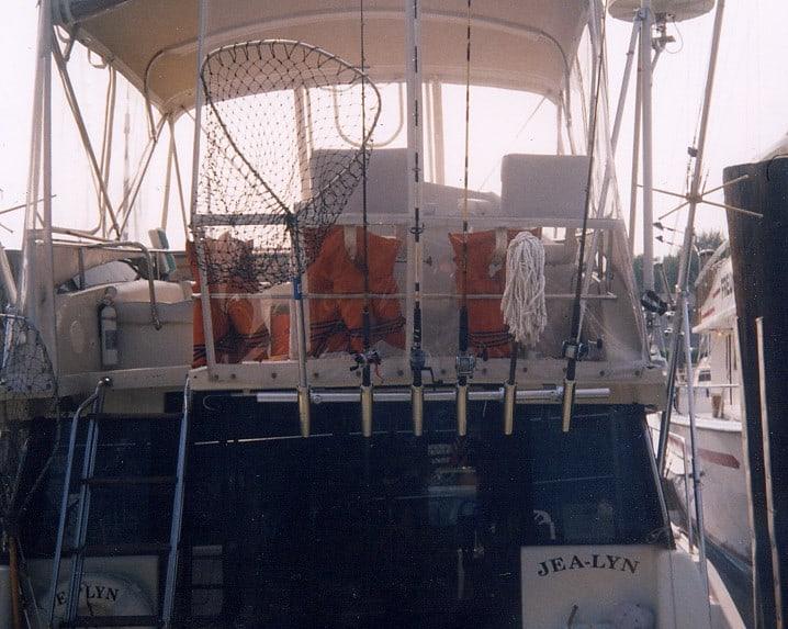 Atlantic Towers Accessories installed on a Silverton 37 Convertible boat, showcasing a functional marine setup.