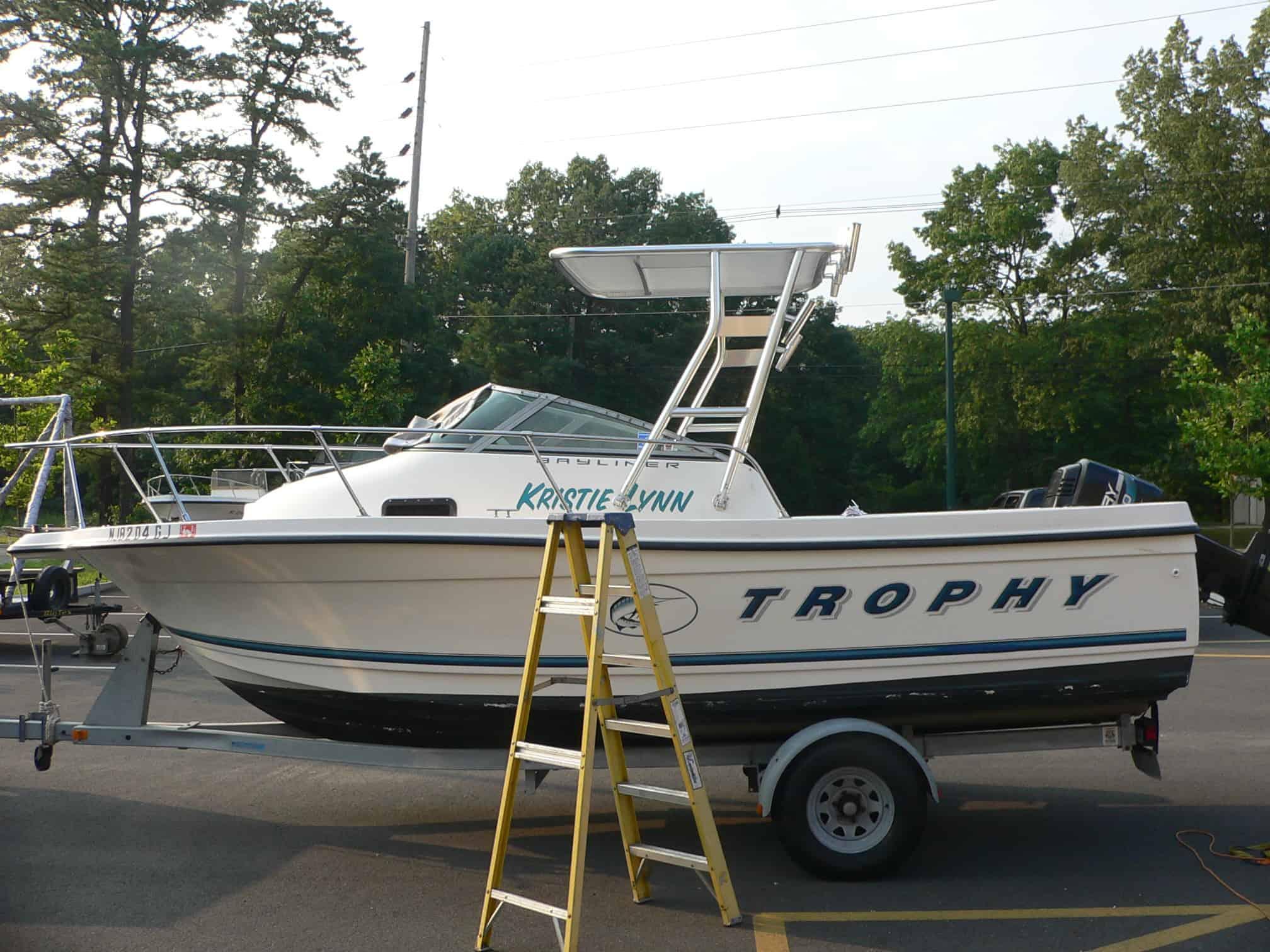 Atlantic Towers Top installed on a Trophy 2002 walkaround boat, showcasing its sleek design and functionality.