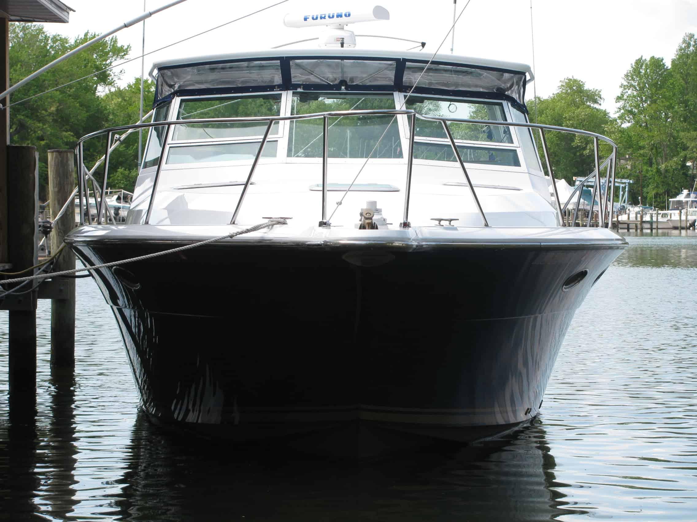 Atlantic Towers Top installed on a Tiara 3600 Open express boat, showcasing a marine accessory for enhanced outdoor space.
