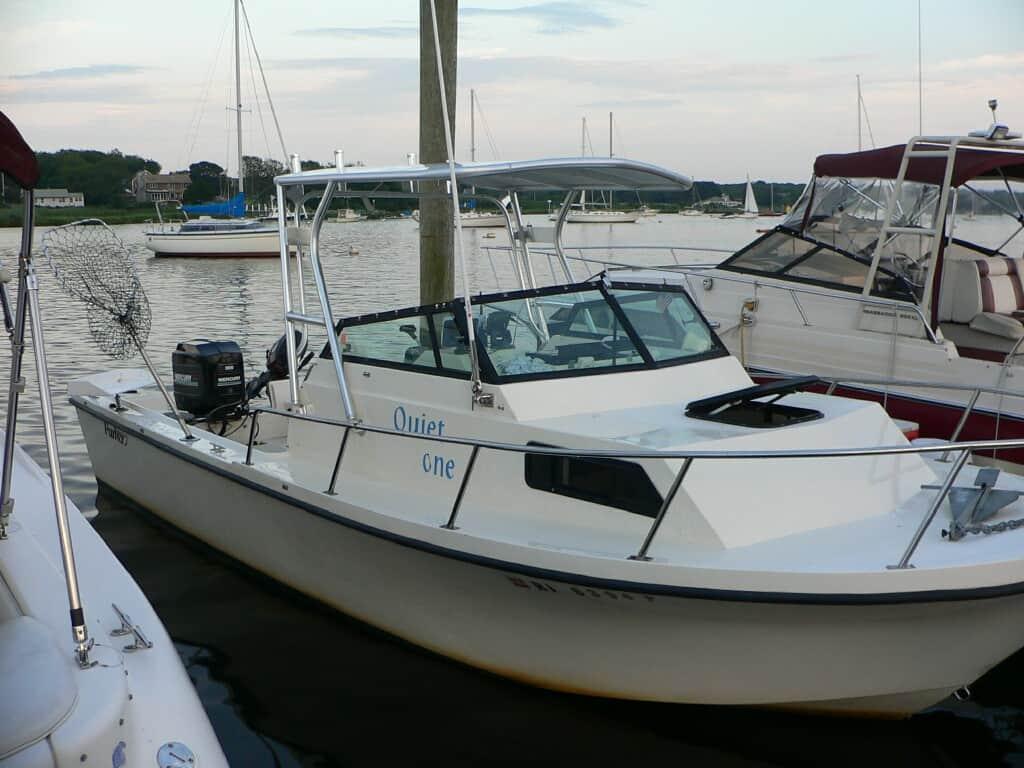 Parker 23 boat named Quiet One docked with an installed Atlantic Towers Top mounted over the center console.