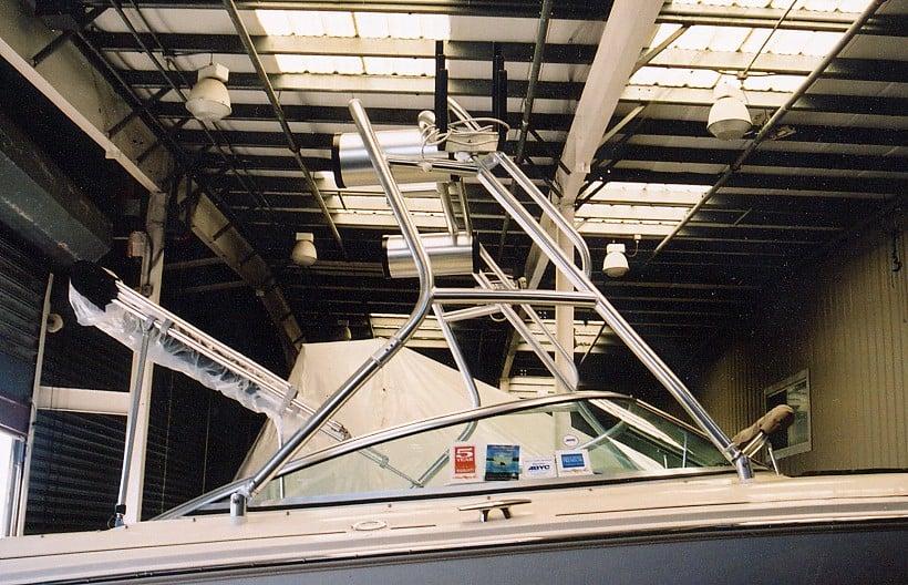 Atlantic Towers Air Tower installed on a Sea Ray 220 BR boat, viewed from the front inside a storage facility.