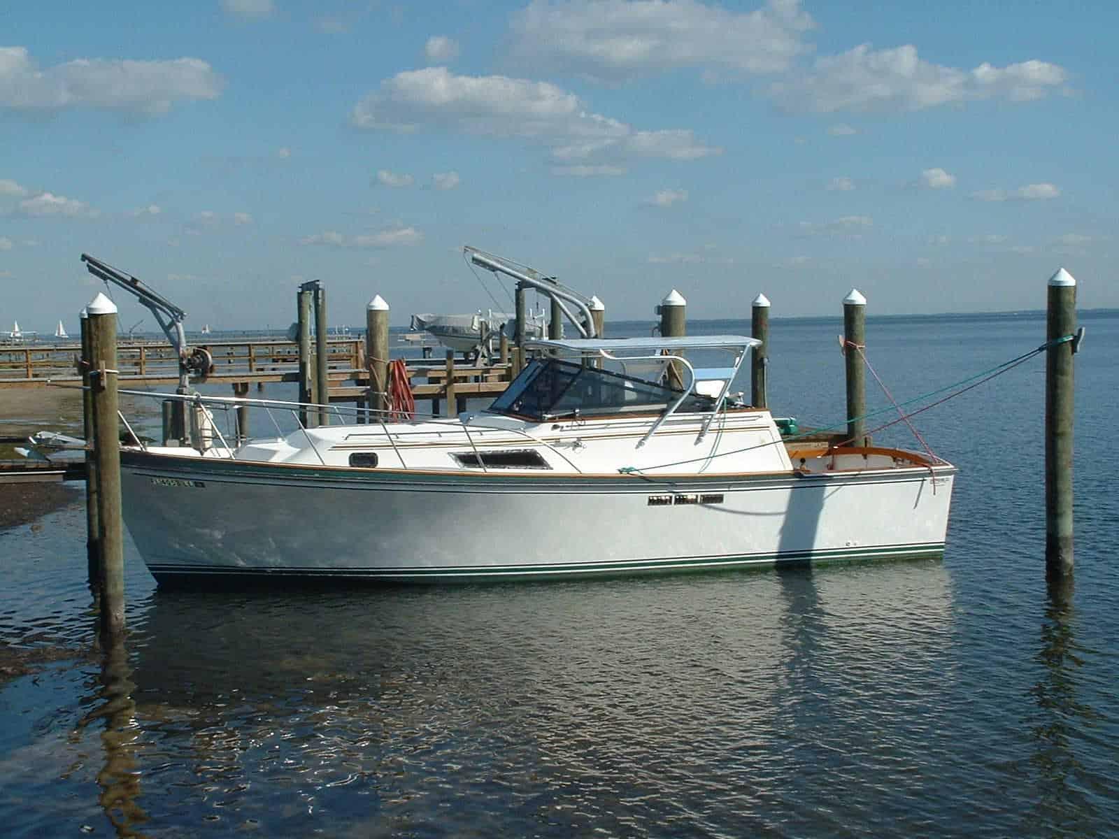 Atlantic Towers Top installed on a Shannon 32Brendan boat docked at a marina with clear blue skies.
