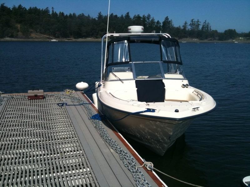 Atlantic Towers arch installed on a Grady White 225 Tournament open bow boat shown from the side on water