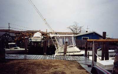 Atlantic Towers Top installed on a Blackfin 29 Flybridge boat docked by the marina.