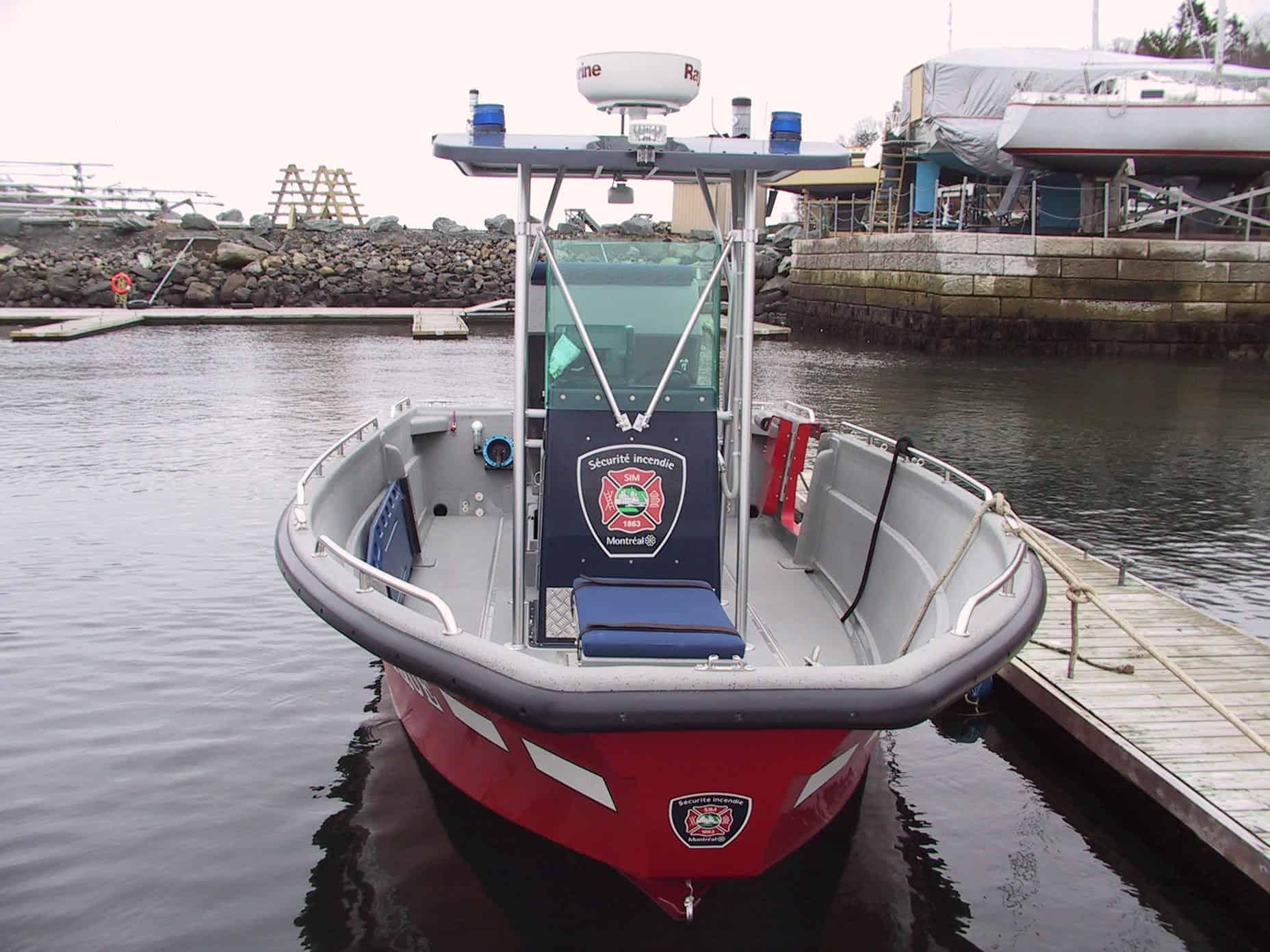 Atlantic Towers T-Top installed on a Rosborough boat, showcasing a functional design in a marina setting.