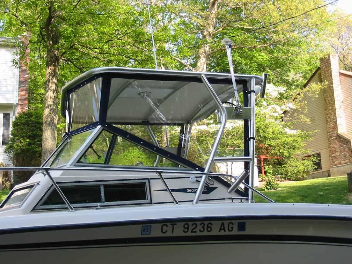 Atlantic Towers Top installed on a Grady White 228G Seafarer boat with windshield and railing visible in outdoor setting.