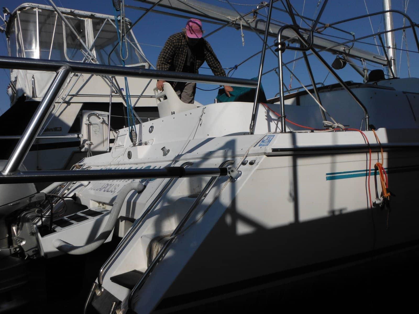 Atlantic Towers Arch installed on a boat, with a person adjusting equipment on the deck.