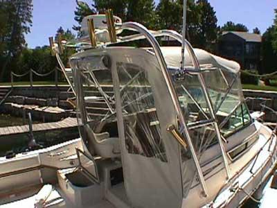 Atlantic Towers Arch installed on a Grady White 230/231/232 Gulfstream boat with a clear windshield and seating area.