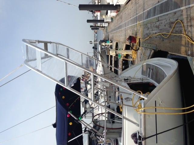 Atlantic Towers arch installed on Jeanneau Sun Odyssey 43 deck salon boat, showing part of the vessel's exterior.